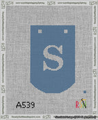 A taped needlepoint canvas with the design: Banner 13 mesh count Curved S White on Blue.