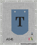 A taped needlepoint canvas with the design: Banner 13 mesh count Curved T Black on Blue.