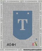 A taped needlepoint canvas with the design: Banner 13 mesh count Curved T White on Blue.