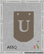 A taped needlepoint canvas with the design: Banner 13 mesh count Curved U White on Brown.