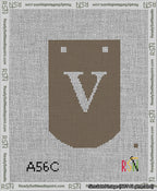 A taped needlepoint canvas with the design: Banner 13 mesh count Curved V White on Brown.