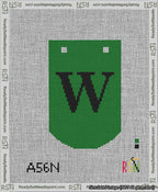 A taped needlepoint canvas with the design: Banner 13 mesh count Curved W Black on Green.