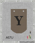 A taped needlepoint canvas with the design: Banner 13 mesh count Curved Y Black on Brown.