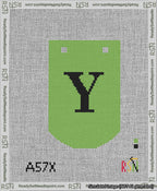 A taped needlepoint canvas with the design: Banner 13 mesh count Curved Y Black on Light Green.