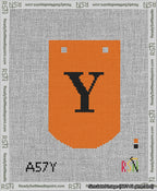 A taped needlepoint canvas with the design: Banner 13 mesh count Curved Y Black on Orange.
