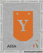 A taped needlepoint canvas with the design: Banner 13 mesh count Curved Y White on Orange.