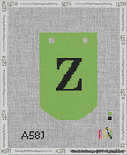 A taped needlepoint canvas with the design: Banner 13 mesh count Curved Z Black on Light Green.