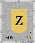 A taped needlepoint canvas with the design: Banner 13 mesh count Curved Z Black on Yellow.