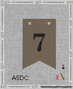 A taped needlepoint canvas with the design: Banner 13 mesh count Forked 7 Black on Brown.