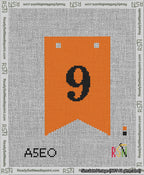 A taped needlepoint canvas with the design: Banner 13 mesh count Forked 9 Black on Orange.
