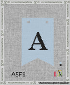 A taped needlepoint canvas with the design: Banner 13 mesh count Forked A Black on Light Blue.