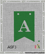 A taped needlepoint canvas with the design: Banner 13 mesh count Forked A White on Green.