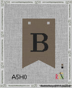 A taped needlepoint canvas with the design: Banner 13 mesh count Forked B Black on Brown.
