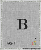 A taped needlepoint canvas with the design: Banner 13 mesh count Forked B Black on White.
