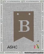 A taped needlepoint canvas with the design: Banner 13 mesh count Forked B White on Brown.