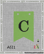 A taped needlepoint canvas with the design: Banner 13 mesh count Forked C Black on Light Green.