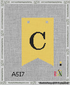 A taped needlepoint canvas with the design: Banner 13 mesh count Forked C Black on Yellow.