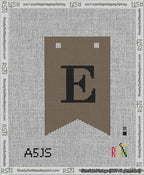 A taped needlepoint canvas with the design: Banner 13 mesh count Forked E Black on Brown.