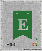 A taped needlepoint canvas with the design: Banner 13 mesh count Forked E White on Green.