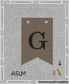 A taped needlepoint canvas with the design: Banner 13 mesh count Forked G Black on Brown.