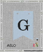 A taped needlepoint canvas with the design: Banner 13 mesh count Forked G Black on Light Blue.