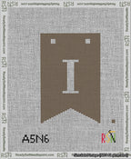 A taped needlepoint canvas with the design: Banner 13 mesh count Forked I White on Brown.