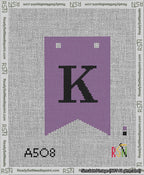 A taped needlepoint canvas with the design: Banner 13 mesh count Forked K Black on Purple.