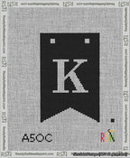 A taped needlepoint canvas with the design: Banner 13 mesh count Forked K White on Black.