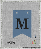 A taped needlepoint canvas with the design: Banner 13 mesh count Forked M Black on Blue.