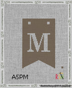 A taped needlepoint canvas with the design: Banner 13 mesh count Forked M White on Brown.