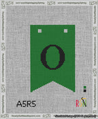 A taped needlepoint canvas with the design: Banner 13 mesh count Forked O Black on Green.