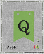 A taped needlepoint canvas with the design: Banner 13 mesh count Forked Q Black on Light Green.