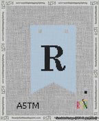 A taped needlepoint canvas with the design: Banner 13 mesh count Forked R Black on Light Blue.
