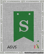 A taped needlepoint canvas with the design: Banner 13 mesh count Forked S White on Green.
