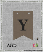 A taped needlepoint canvas with the design: Banner 13 mesh count Forked Y Black on Brown.