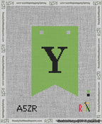 A taped needlepoint canvas with the design: Banner 13 mesh count Forked Y Black on Light Green.