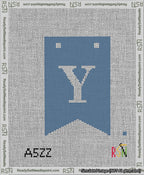 A taped needlepoint canvas with the design: Banner 13 mesh count Forked Y White on Blue.
