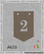 A taped needlepoint canvas with the design: Banner 13 mesh count Pointed 2 White on Brown.
