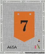 A taped needlepoint canvas with the design: Banner 13 mesh count Pointed 7 Black on Orange.