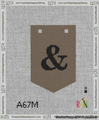 A taped needlepoint canvas with the design: Banner 13 mesh count Pointed Ampersand Black on Brown.