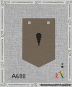 A taped needlepoint canvas with the design: Banner 13 mesh count Pointed Apostrophe Black on Brown.