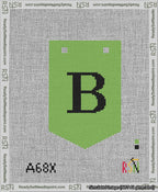 A taped needlepoint canvas with the design: Banner 13 mesh count Pointed B Black on Light Green.
