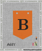 A taped needlepoint canvas with the design: Banner 13 mesh count Pointed B Black on Orange.