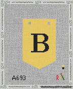 A taped needlepoint canvas with the design: Banner 13 mesh count Pointed B Black on Yellow.