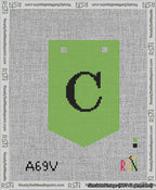 A taped needlepoint canvas with the design: Banner 13 mesh count Pointed C Black on Light Green.