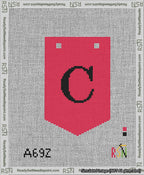 A taped needlepoint canvas with the design: Banner 13 mesh count Pointed C Black on Red.