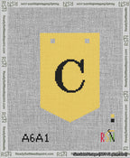 A taped needlepoint canvas with the design: Banner 13 mesh count Pointed C Black on Yellow.
