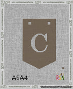 A taped needlepoint canvas with the design: Banner 13 mesh count Pointed C White on Brown.