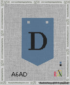 A taped needlepoint canvas with the design: Banner 13 mesh count Pointed D Black on Blue.