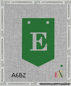 A taped needlepoint canvas with the design: Banner 13 mesh count Pointed E White on Green.